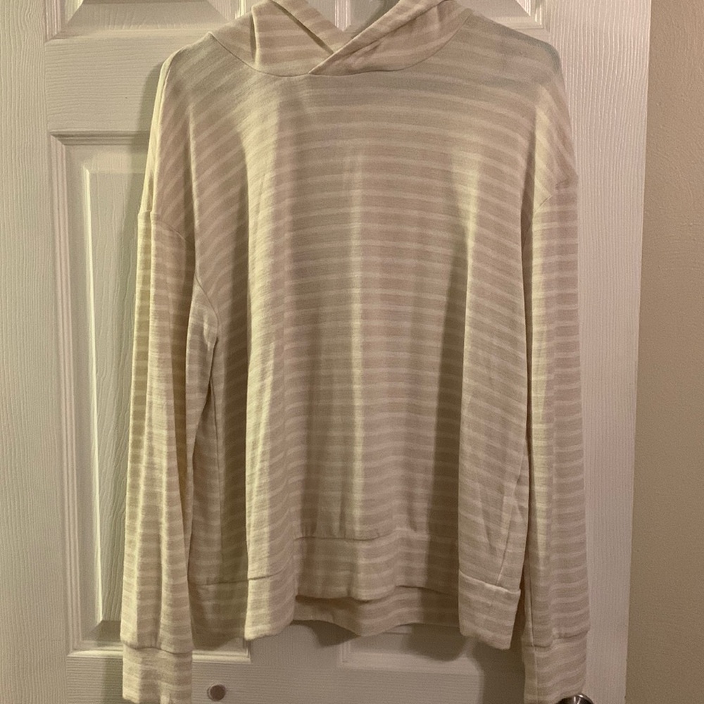 beige and white striped hooded lightweight sweatshirt